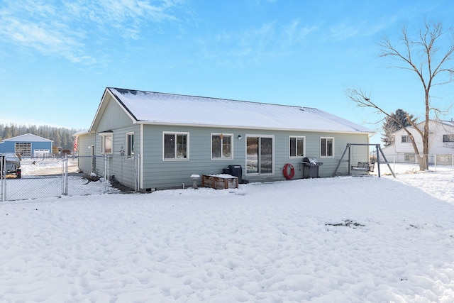 view of snow covered house