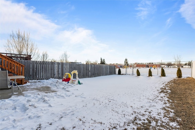 view of yard covered in snow