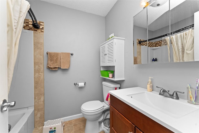 full bathroom featuring vanity, a textured ceiling, tile patterned floors, toilet, and shower / bath combo with shower curtain