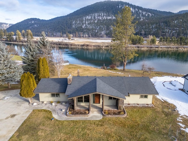 bird's eye view featuring a water and mountain view