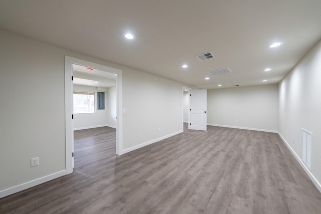 spare room with light hardwood / wood-style flooring