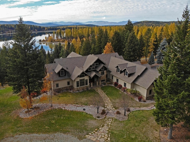 bird's eye view with a water and mountain view