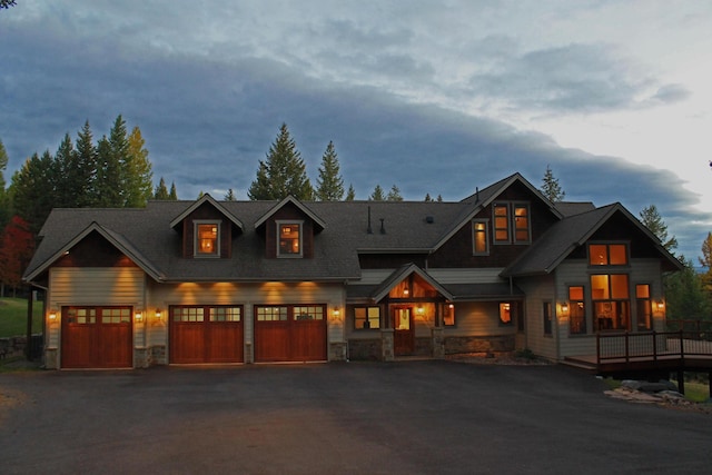 craftsman inspired home featuring a garage