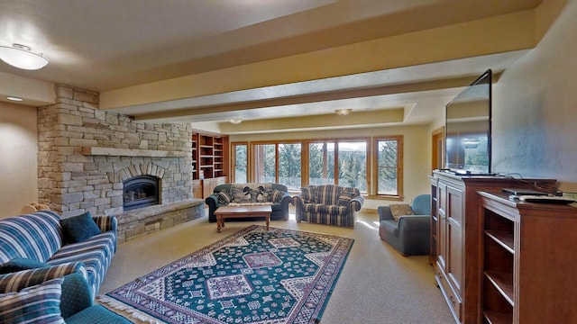 living room featuring a fireplace and light carpet