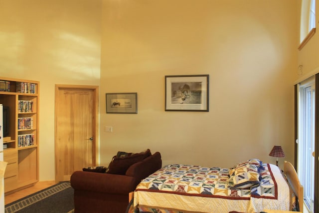 bedroom with a high ceiling