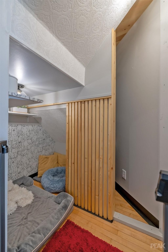 bonus room with hardwood / wood-style flooring