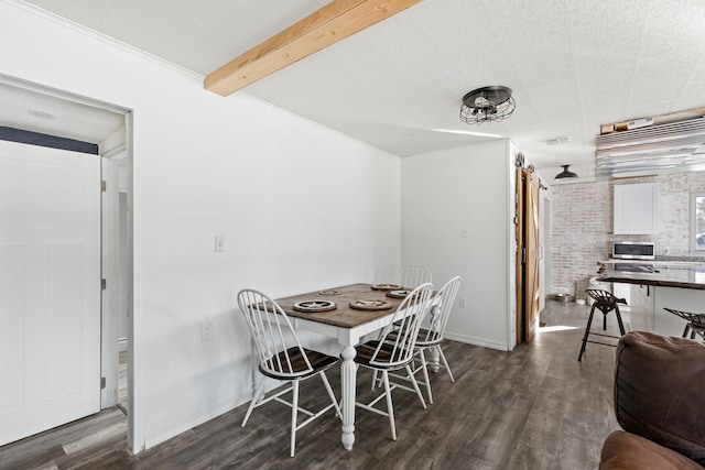 dining area featuring wood finished floors, baseboards, beamed ceiling, and brick wall