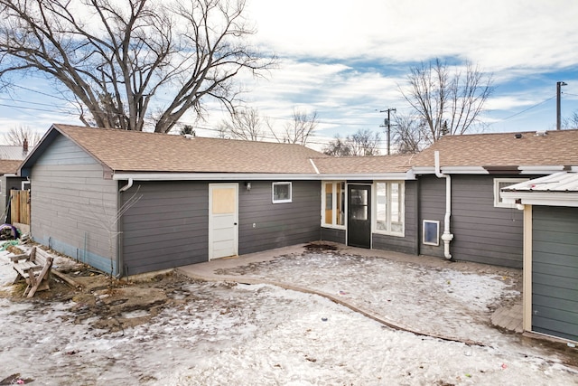 back of house with a patio