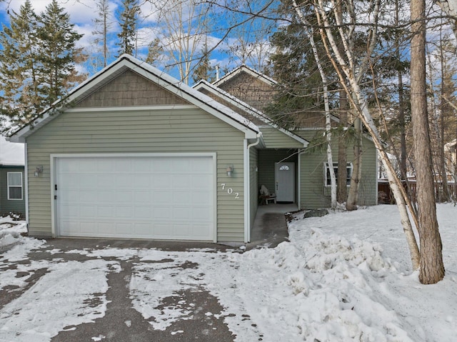 view of front of property with a garage