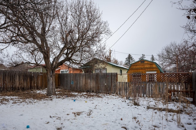 view of yard covered in snow