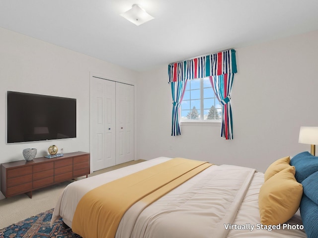 carpeted bedroom with a closet