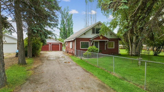 log home with a garage, an outdoor structure, and a front lawn