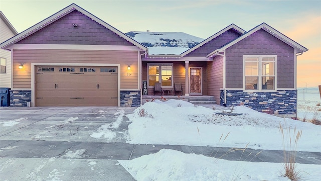 craftsman-style home featuring a garage