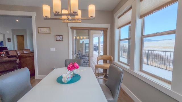 dining room with a notable chandelier