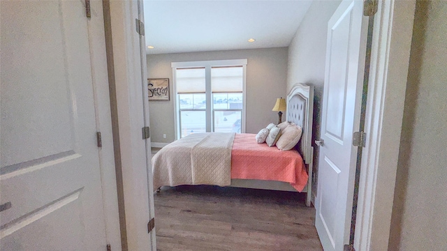 bedroom featuring hardwood / wood-style floors