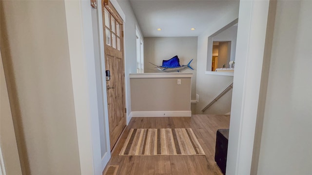 hall featuring hardwood / wood-style flooring