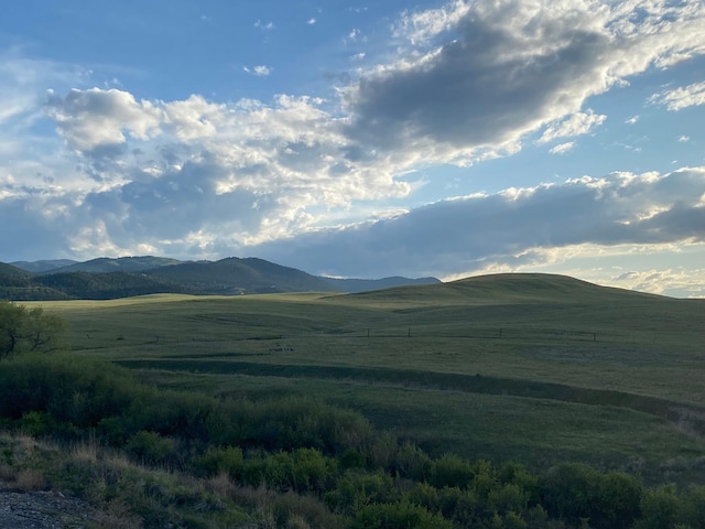 view of mountain feature featuring a rural view