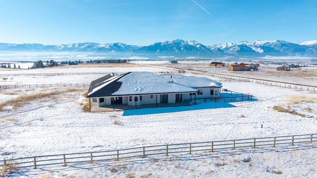 property view of mountains featuring a rural view