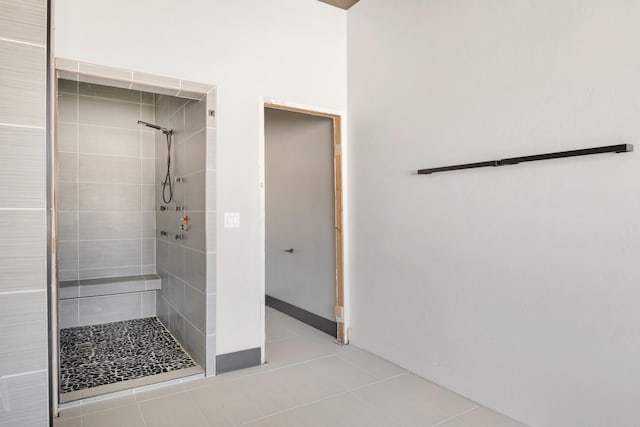 2986 Sunset Ranch Ln, Stevensville, MT 59870 - bathroom with tile patterned flooring and a tile shower