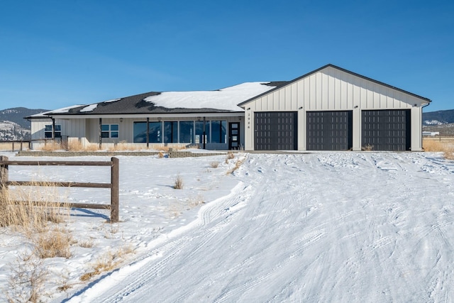 2986 Sunset Ranch Ln, Stevensville, MT 59870 - view of front of property featuring a garage and a mountain view