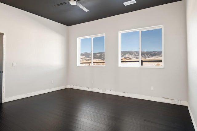 2986 Sunset Ranch Ln, Stevensville, MT 59870 - unfurnished room with dark hardwood / wood-style floors and ceiling fan