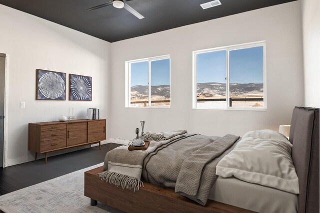 2986 Sunset Ranch Ln, Stevensville, MT 59870 - bedroom featuring dark hardwood / wood-style floors and ceiling fan