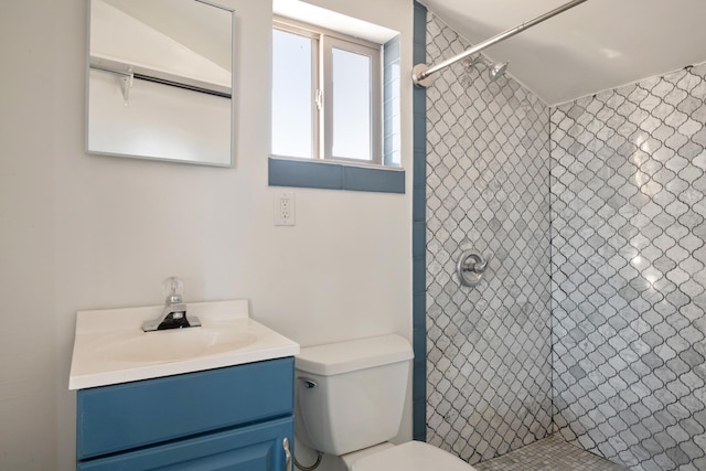 2986 Sunset Ranch Ln, Stevensville, MT 59870 - bathroom with vanity, toilet, and a tile shower
