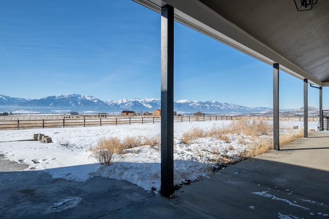 2986 Sunset Ranch Ln, Stevensville, MT 59870 - yard layered in snow with a mountain view