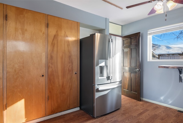 kitchen featuring hardwood / wood-style floors, stainless steel fridge, and ceiling fan