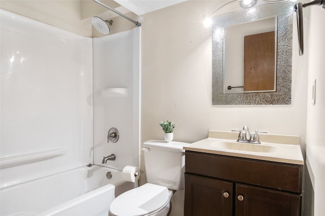 full bathroom with vanity, shower / tub combination, and toilet