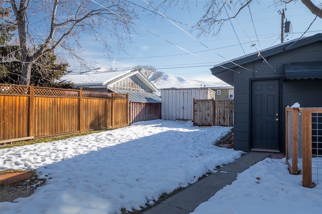 view of yard covered in snow