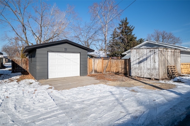 view of snow covered garage