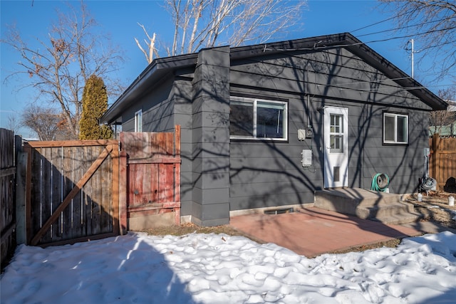 view of snow covered property