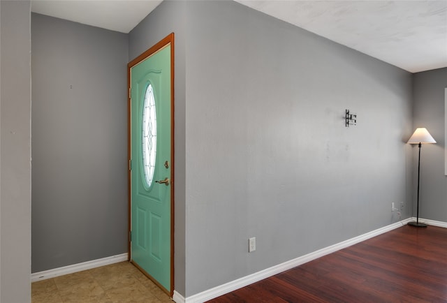 entrance foyer with hardwood / wood-style floors