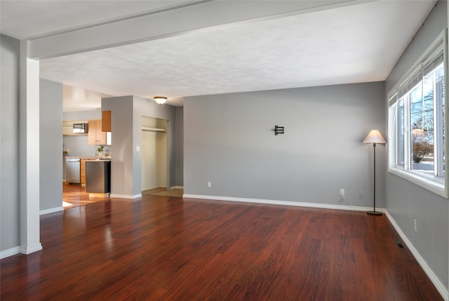 unfurnished room with wood-type flooring