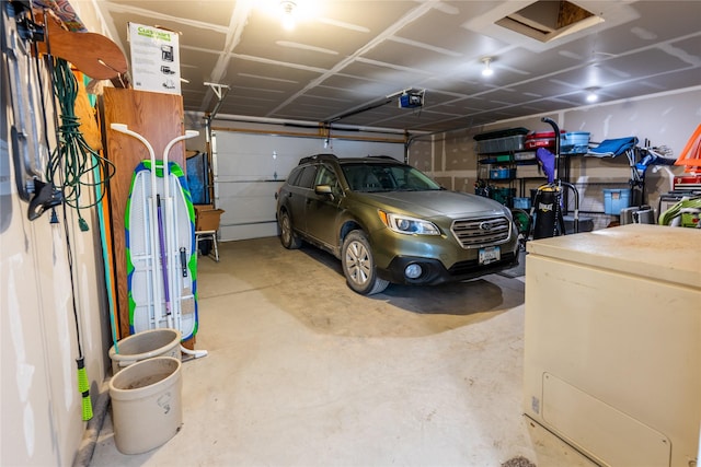 garage featuring a garage door opener