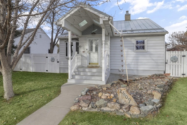 bungalow with a front lawn