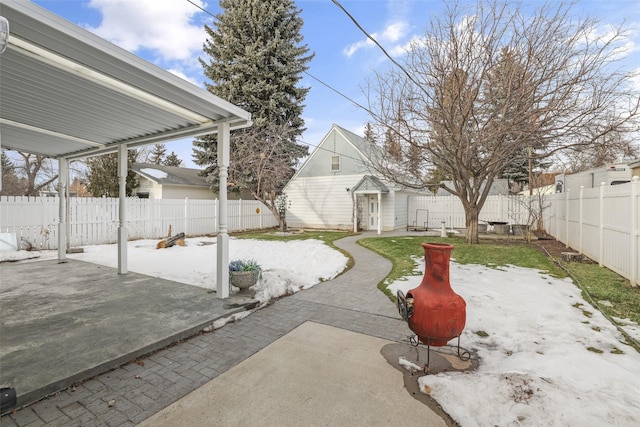 view of yard with an outbuilding and a patio area