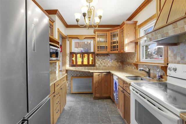 kitchen featuring tasteful backsplash, sink, and stainless steel appliances