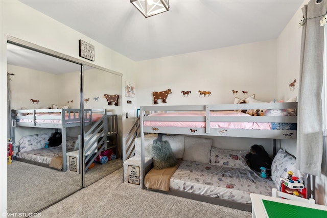 carpeted bedroom with a closet