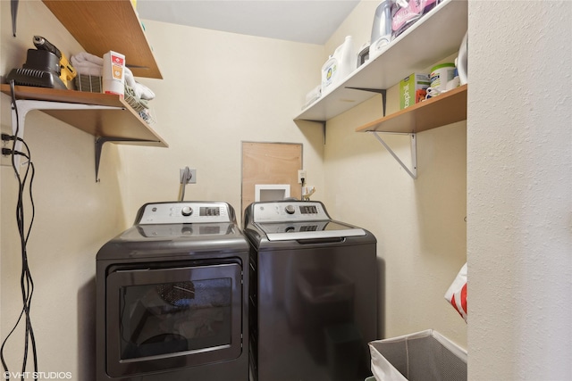 washroom with separate washer and dryer