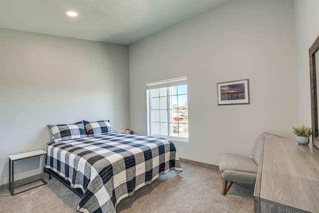 bedroom with light colored carpet