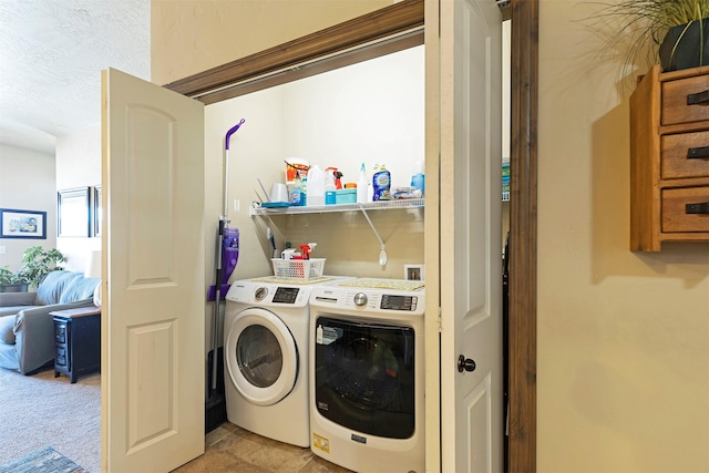 laundry room with washer and clothes dryer