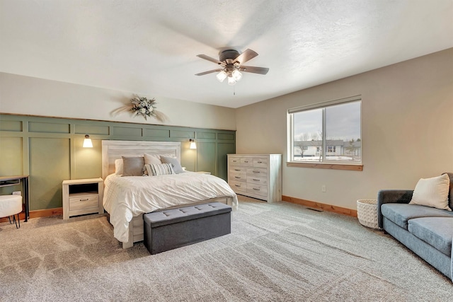 bedroom featuring ceiling fan and carpet flooring