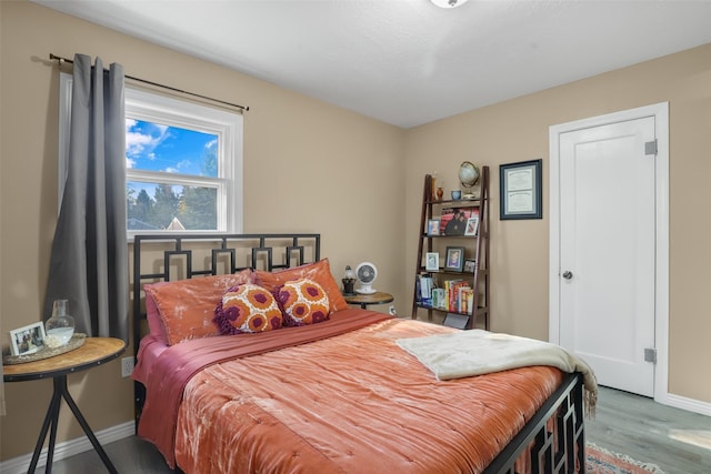 bedroom featuring hardwood / wood-style flooring