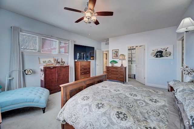 bedroom with light colored carpet and ceiling fan