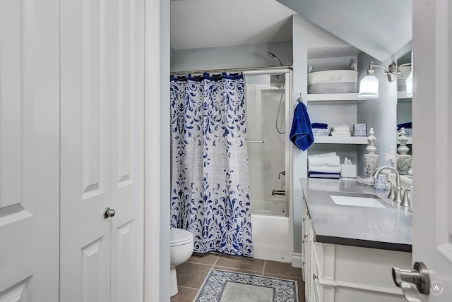 full bathroom with tile patterned flooring, vanity, shower / bath combo, and toilet