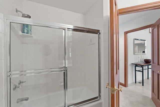 bathroom featuring enclosed tub / shower combo