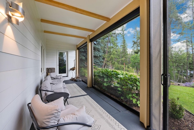 sunroom / solarium with beam ceiling