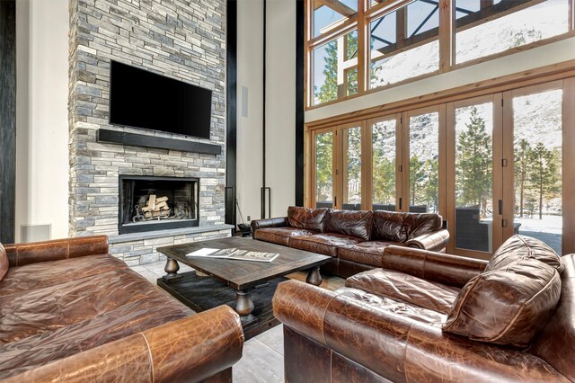 1180 Reardon Ln, Alberton, MT 59820 - living area with a towering ceiling and a fireplace